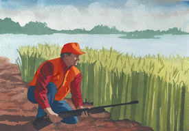 Still hunter crouching by edge of marsh